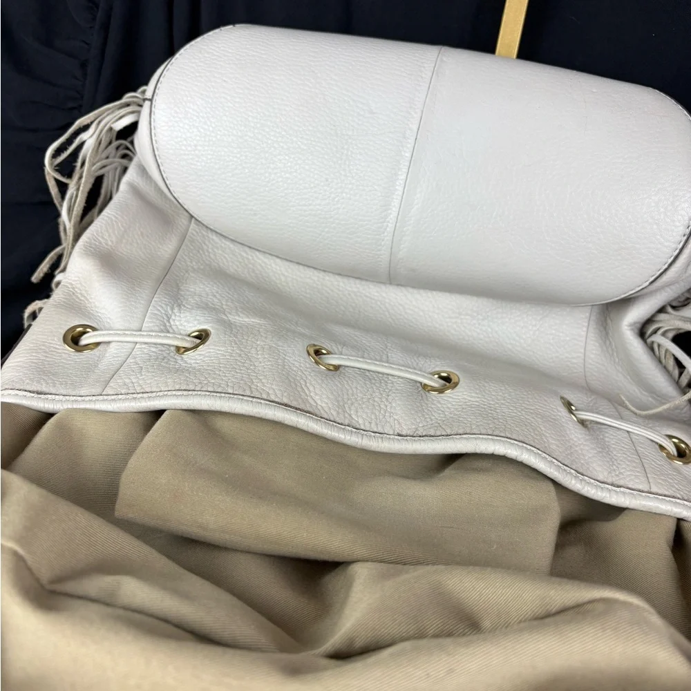 G.I.L.I. Got It. Love It. White Pebbled Leather Drawstring Hobo Tassel